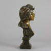 Silvia by Emmanuel Villanis a very fine late 19th Century French bronze bust of an attractive classical maiden modelled in the Art Nouveau style, with fabulous multi hued patination of brown and a subtle green