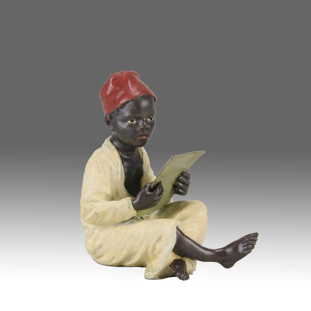 Bergman bronze boy reading