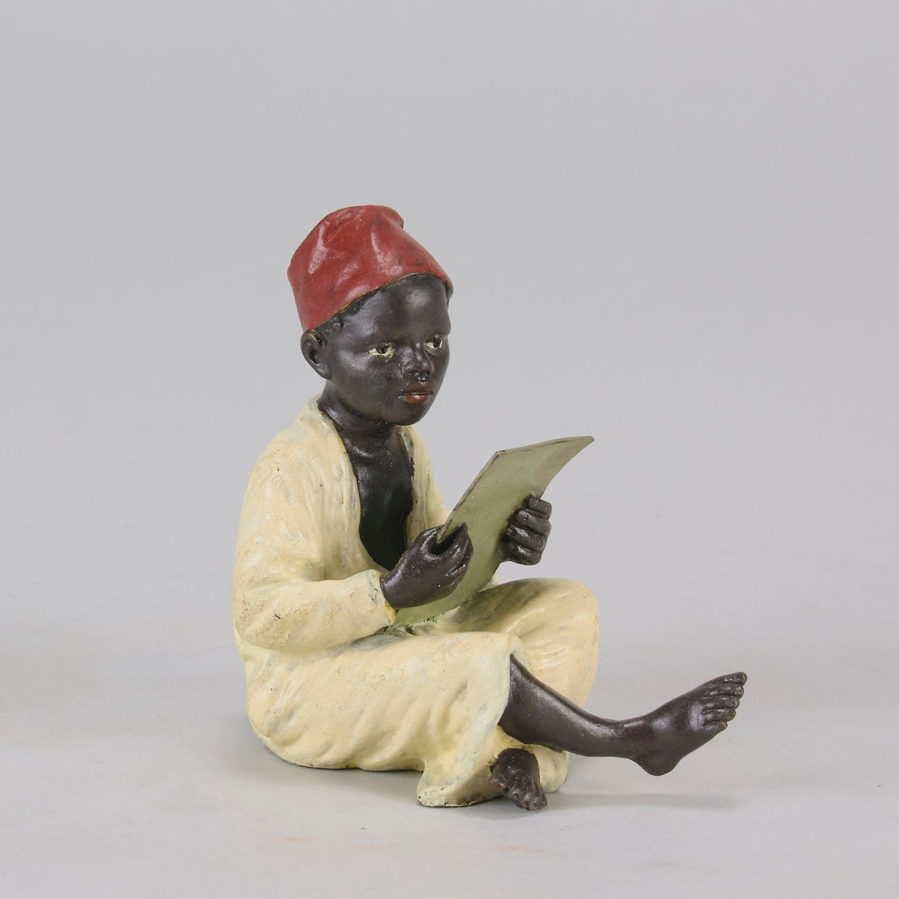 Bergman bronze boy reading