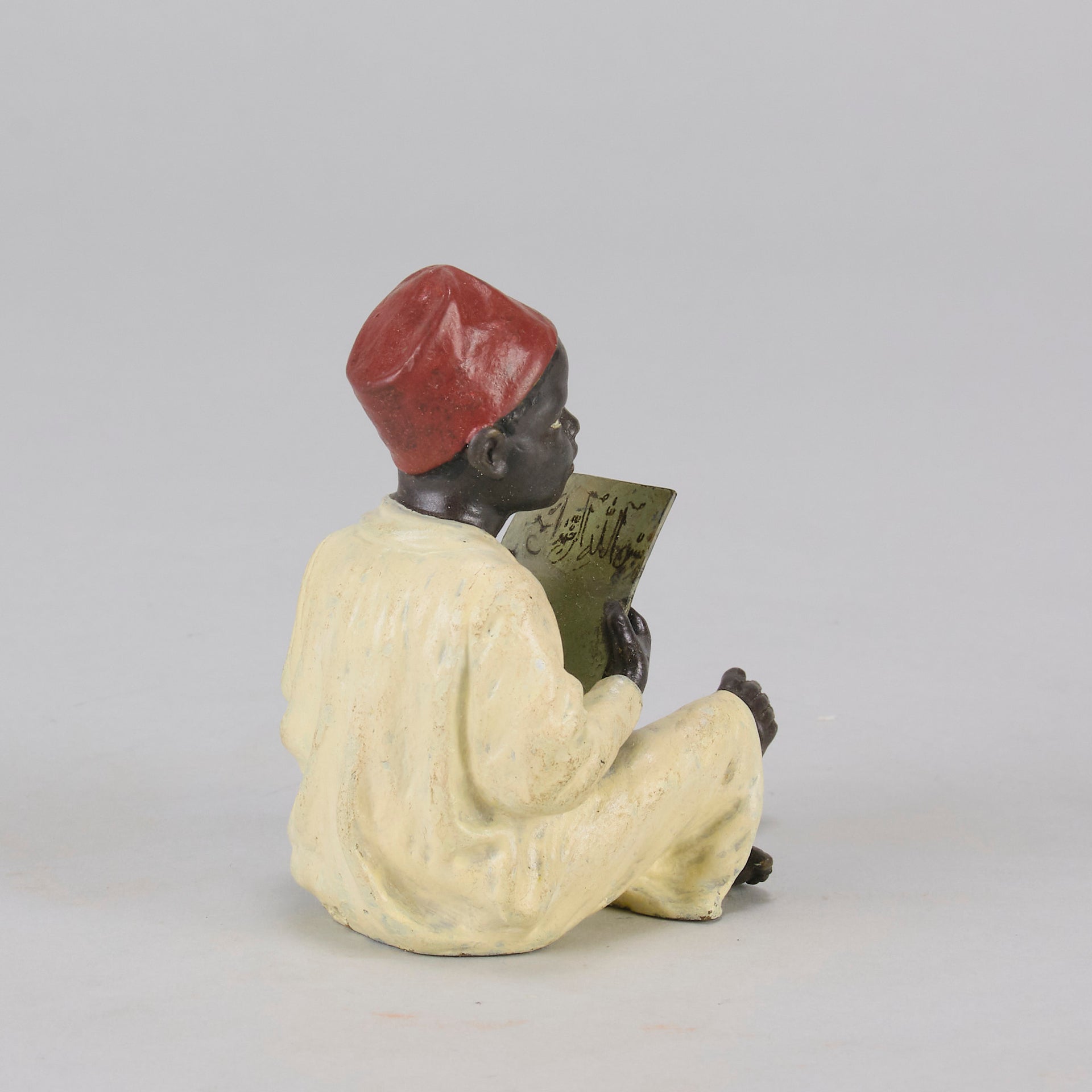 Bergman bronze boy reading