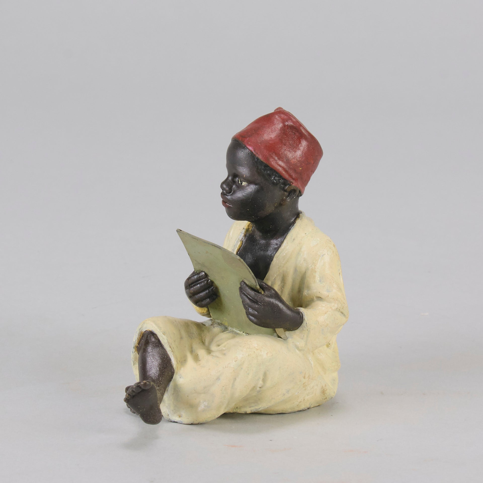 Bergman bronze boy reading