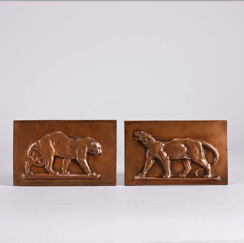 Panther and Leopard Plaques by Antoine L Barye one decorated with a striding panther the other of a striding leopard. The bronze plaques with excellent hand chased surface detail and very fine rich mid to golden brown patina
