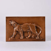Panther and Leopard Plaques by Antoine L Barye one decorated with a striding panther the other of a striding leopard. The bronze plaques with excellent hand chased surface detail and very fine rich mid to golden brown patina