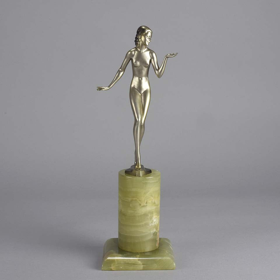 Art Deco Lady by Adolph in a questioning pose with one hand out, signed Adolph and raised on a tall cylindrical Brazilian green onyx base