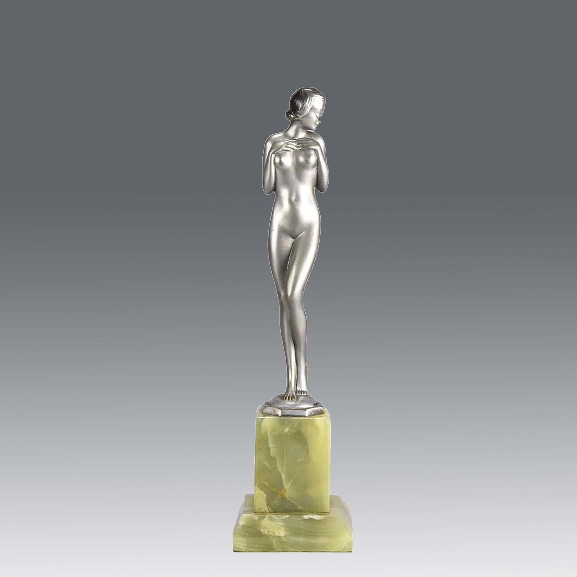Shy Maiden an Antique Bronze Figure by Josef Adolph depicting a naked beauty in a revealing pose with very fine colour and excellent detail, raised on an onyx base