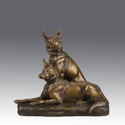Two Alsatians by Louis Riché  gilt bronze group of two Alsatians, one seated in alert pose with its head turned slightly and ears pricked whilst the other one lays in an alert pose
