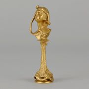 Art Nouveau Desk Seal a very fine early 20th Century French gilt bronze desk seal modelled as the head and shoulders of an Art Nouveau maiden with organic theme decorated with flowers