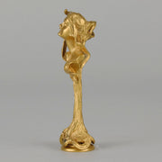 Art Nouveau Desk Seal a very fine early 20th Century French gilt bronze desk seal modelled as the head and shoulders of an Art Nouveau maiden with organic theme decorated with flowers