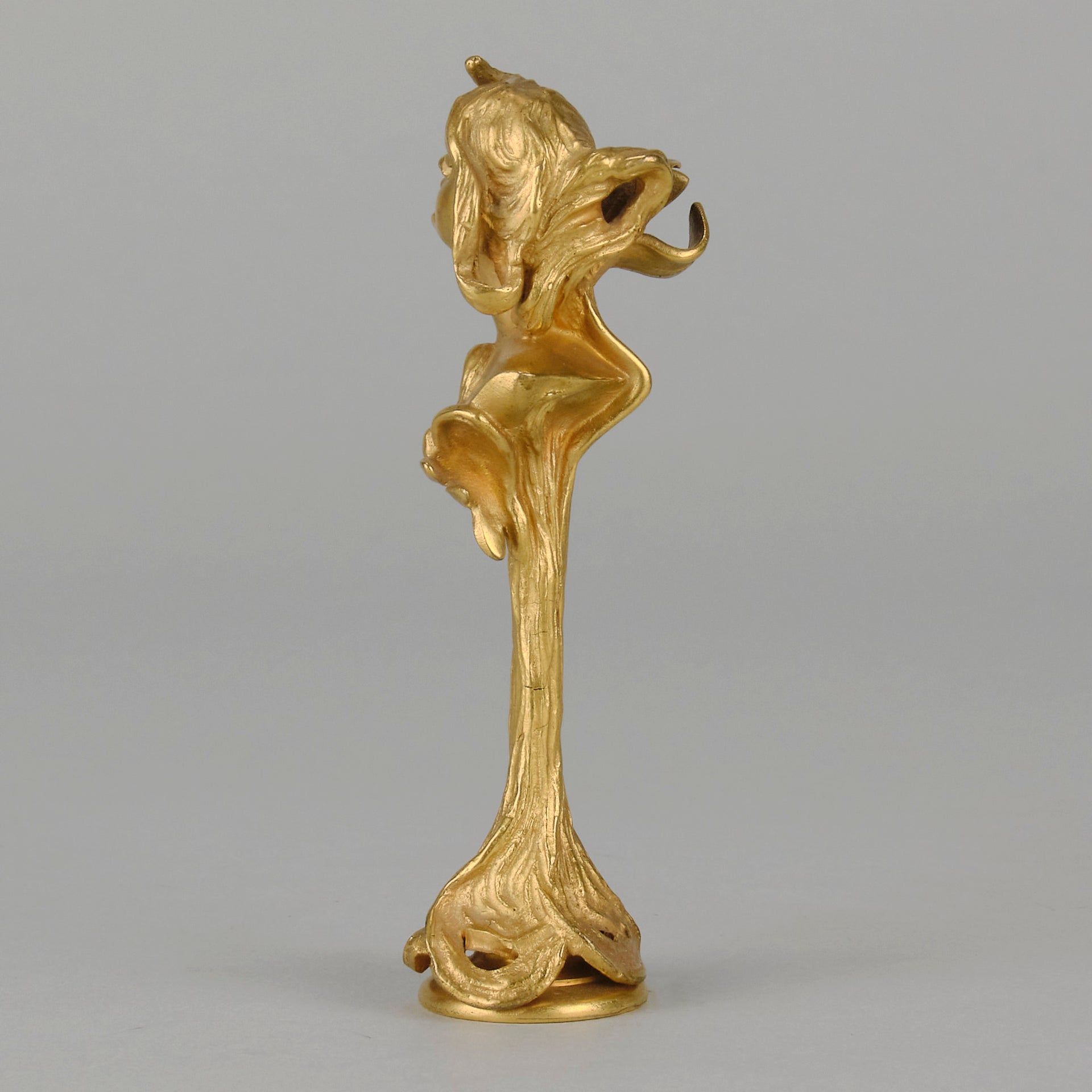 Art Nouveau Desk Seal a very fine early 20th Century French gilt bronze desk seal modelled as the head and shoulders of an Art Nouveau maiden with organic theme decorated with flowers