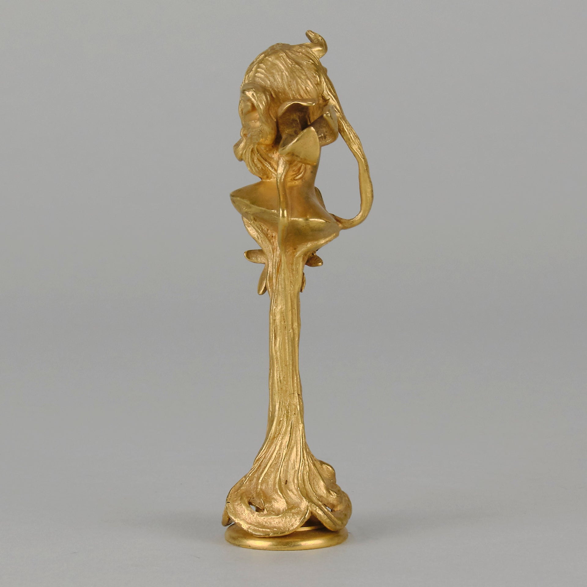 Art Nouveau Desk Seal a very fine early 20th Century French gilt bronze desk seal modelled as the head and shoulders of an Art Nouveau maiden with organic theme decorated with flowers