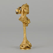 Art Nouveau Desk Seal a very fine early 20th Century French gilt bronze desk seal modelled as the head and shoulders of an Art Nouveau maiden with organic theme decorated with flowers