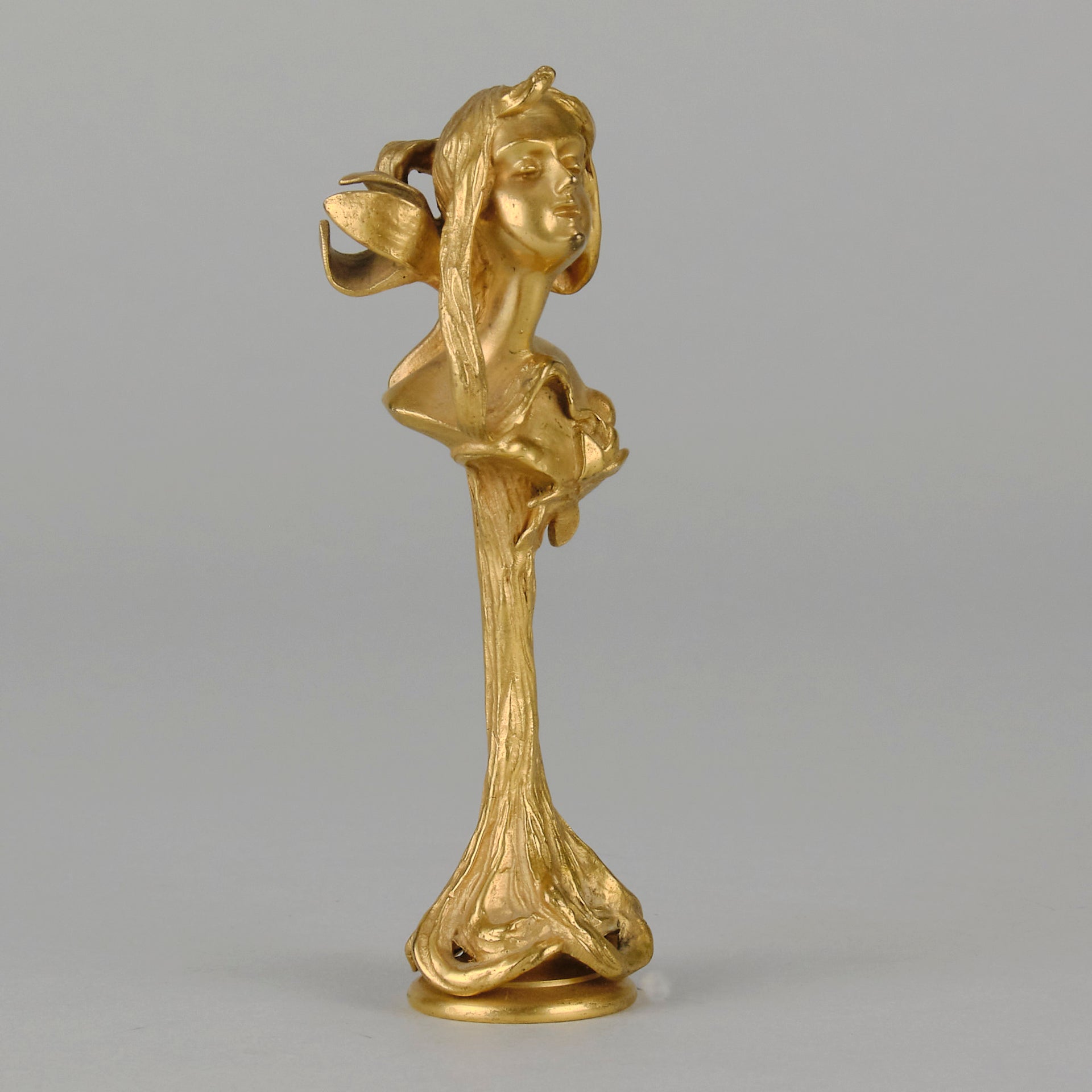 Art Nouveau Desk Seal a very fine early 20th Century French gilt bronze desk seal modelled as the head and shoulders of an Art Nouveau maiden with organic theme decorated with flowers