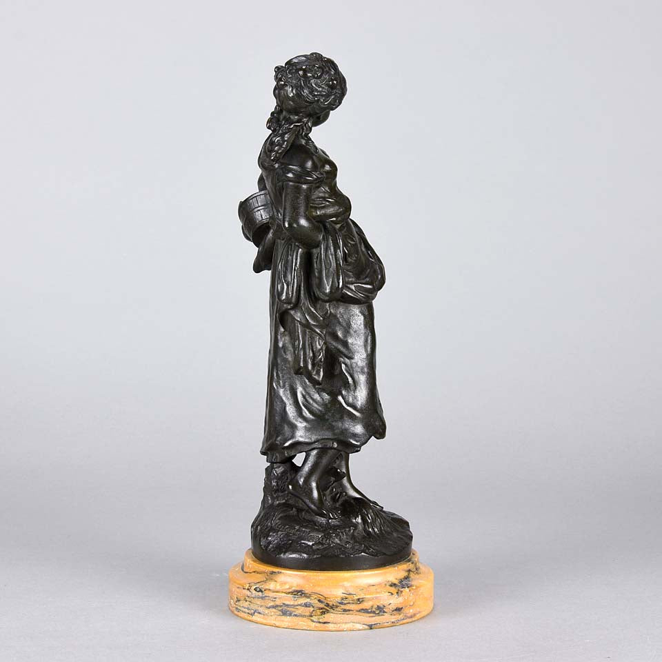 Autumn an antique bronze figure by Auguste Moreau a figure of a young farm girl carrying a laden basket with very fine colour and excellent had finished surface detail, raised on a marble base 