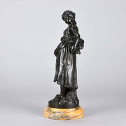 Autumn an antique bronze figure by Auguste Moreau a figure of a young farm girl carrying a laden basket with very fine colour and excellent had finished surface detail, raised on a marble base 