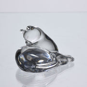 A charming mid 20th Century clear glass study of a relaxed cat in a reclining position grooming itself, with excellent smooth tactile surface, signed under base 