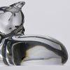 A charming mid 20th Century clear glass study of a relaxed cat in a reclining position grooming itself, with excellent smooth tactile surface, signed under base 