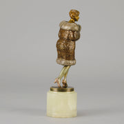 Fur Coat by Barner An excellent early 20th Century Austrian bronze figure of an Art Deco beauty in a large fur coat - Hickmet Fine Arts