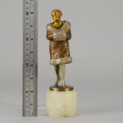 Fur Coat by Barner An excellent early 20th Century Austrian bronze figure of an Art Deco beauty in a large fur coat - Hickmet Fine Arts
