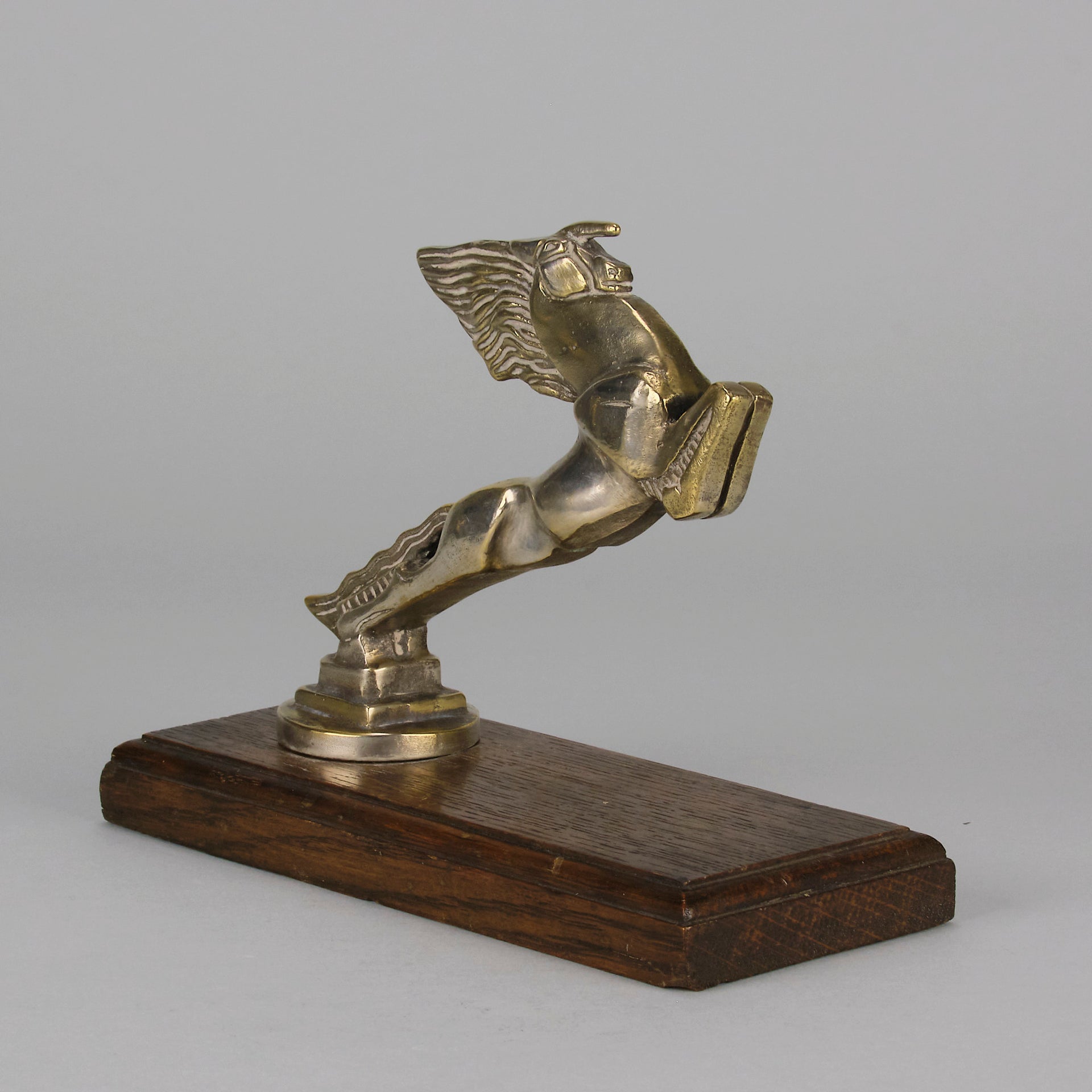 Leaping Horse Car Bonnet Mascot by François Bazin  silver plated in the form of a leaping horse, with fine detail. Raised on a wooden rectangular base