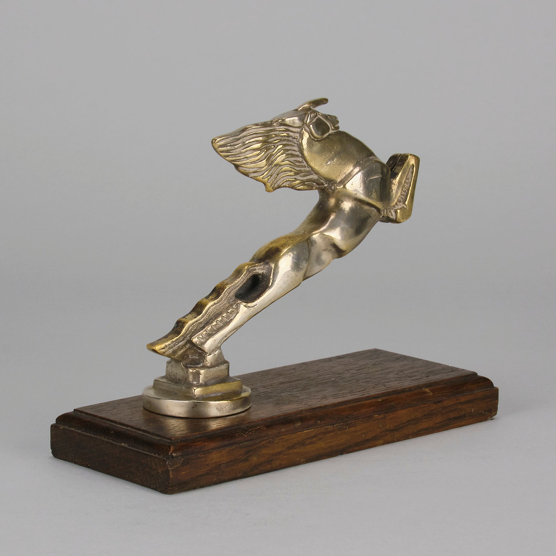 Leaping Horse Car Bonnet Mascot by François Bazin  silver plated in the form of a leaping horse, with fine detail. Raised on a wooden rectangular base
