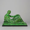 Femme Allongée early 20th Century French Art Deco bronze figure of a resting beauty reclining on a day bed with a shawl delicately draped over her by Gaston Béguin - Hickmet Fine Arts 