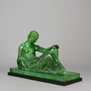 Femme Allongée early 20th Century French Art Deco bronze figure of a resting beauty reclining on a day bed with a shawl delicately draped over her by Gaston Béguin - Hickmet Fine Arts 