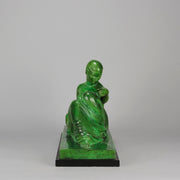 Femme Allongée early 20th Century French Art Deco bronze figure of a resting beauty reclining on a day bed with a shawl delicately draped over her by Gaston Béguin - Hickmet Fine Arts 