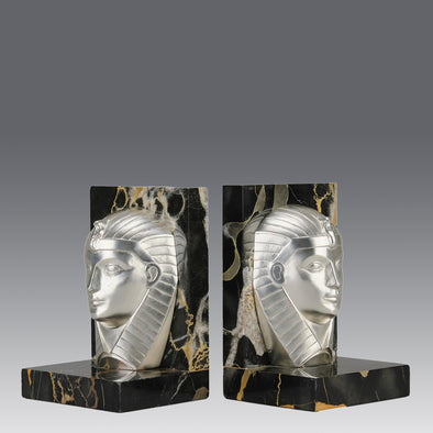 Art Deco silvered bronze bookends in the form of two Pharoah heads mounted on marble bases by Charles Charles - Hickmet Fine Arts