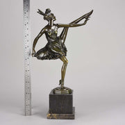 High Kick by Bruno Zach an Antique Bronze Figure of an energetic dancer with her leg raised high. The surface of the bronze with excellent deep rich colour and very fine hand finished detail, raised on a marble base  