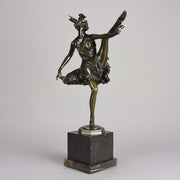 High Kick by Bruno Zach an Antique Bronze Figure of an energetic dancer with her leg raised high. The surface of the bronze with excellent deep rich colour and very fine hand finished detail, raised on a marble base  