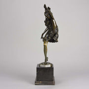 High Kick by Bruno Zach an Antique Bronze Figure of an energetic dancer with her leg raised high. The surface of the bronze with excellent deep rich colour and very fine hand finished detail, raised on a marble base  