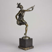 High Kick by Bruno Zach an Antique Bronze Figure of an energetic dancer with her leg raised high. The surface of the bronze with excellent deep rich colour and very fine hand finished detail, raised on a marble base  