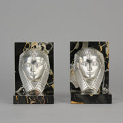 Art Deco silvered bronze bookends in the form of two Pharoah heads mounted on marble bases by Charles Charles - Hickmet Fine Arts
