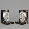 Art Deco silvered bronze bookends in the form of two Pharoah heads mounted on marble bases by Charles Charles - Hickmet Fine Arts