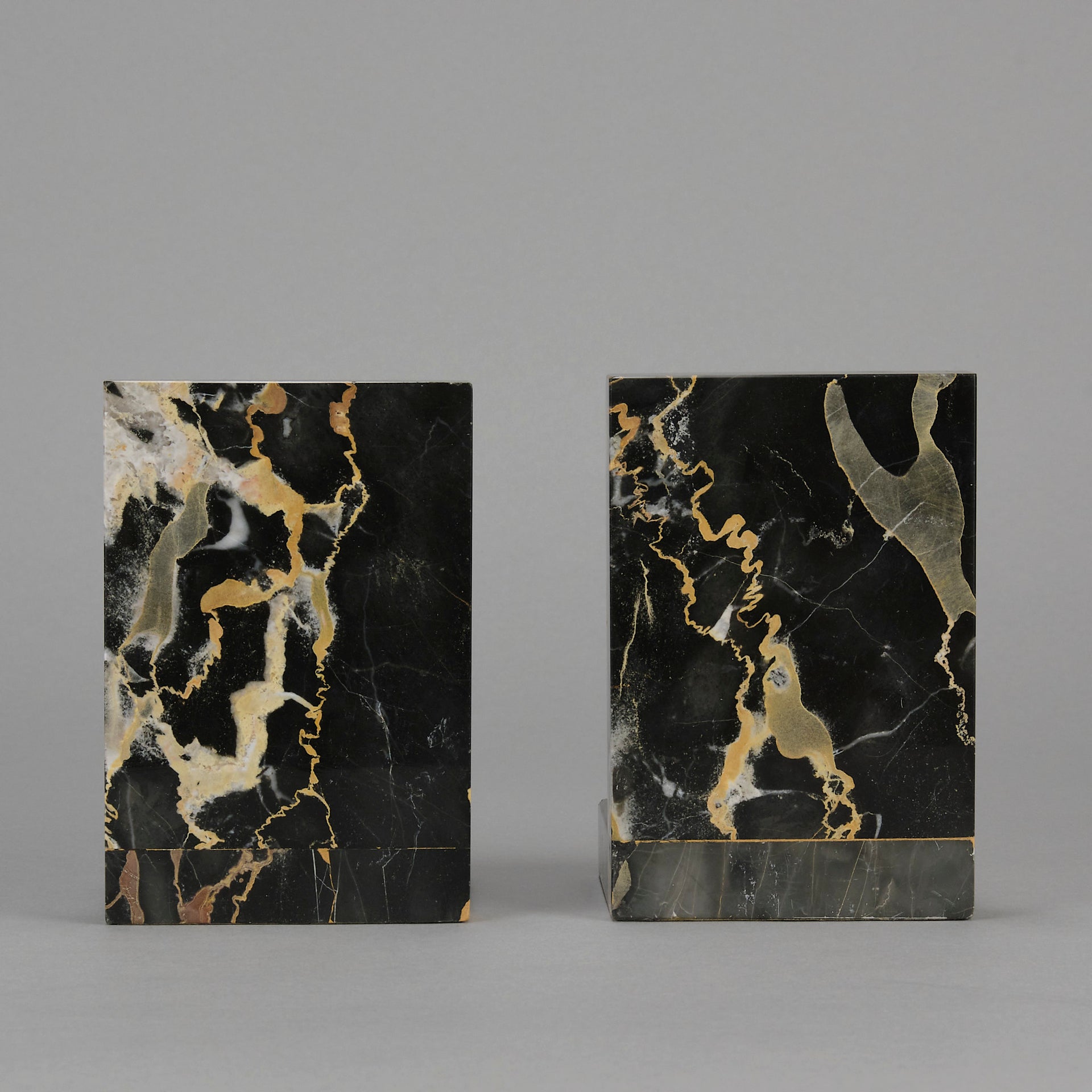 Art Deco silvered bronze bookends in the form of two Pharoah heads mounted on marble bases by Charles Charles - Hickmet Fine Arts