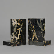 Art Deco silvered bronze bookends in the form of two Pharoah heads mounted on marble bases by Charles Charles - Hickmet Fine Arts