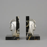 Art Deco silvered bronze bookends in the form of two Pharoah heads mounted on marble bases by Charles Charles - Hickmet Fine Arts