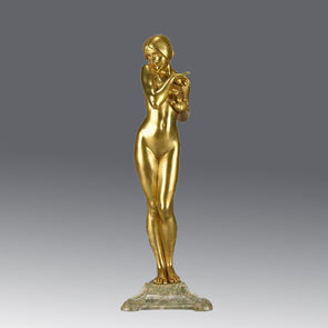 La Femme Nue an antique bronze figure by Louis Chalon depicting gilt bronze figure of a beautiful naked lady standing in a coy pose, the surface of the bronze with a wonderful smooth tactile finish. Raised on a shaped marble base  