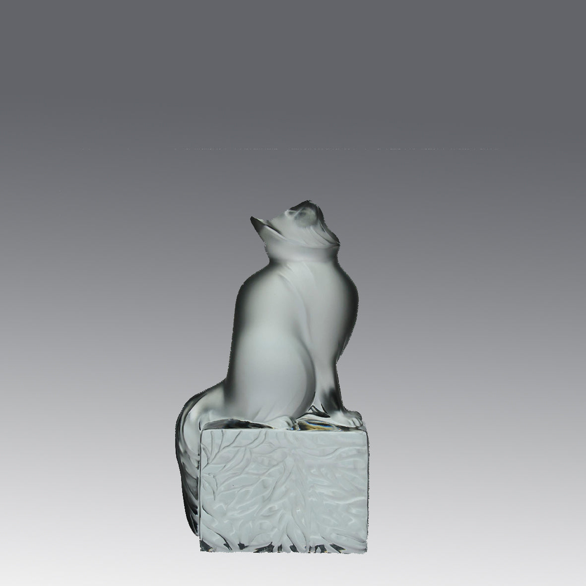 Chat Attente a charming frosted glass study of a seated cat with its head raised in a concentrated pose by Marc Lalique