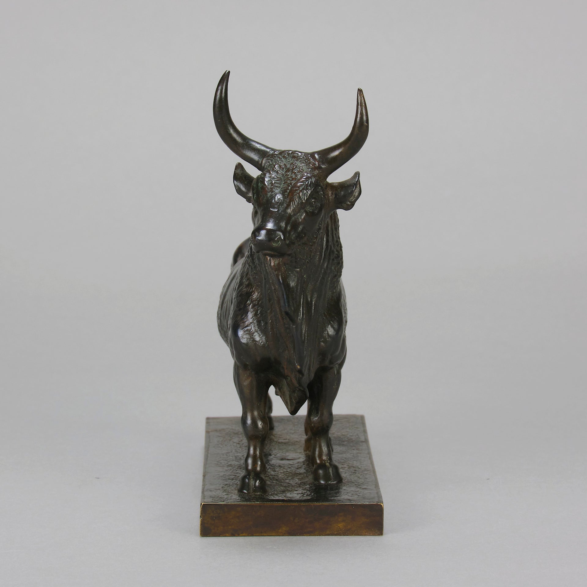 Taureau Vainqueur Antique Bronze Statue of a Bull by Jean-Baptiste Clesinger standing in a proud stance exhibiting excellent hand chased surface detail and fine rich brown patina. Raised on an integral base 