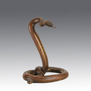 Rearing Snake an early 20th Century Art Deco bronze study of a rearing snake, its tail curled and head raised in an alert position by Edgar Brandt 