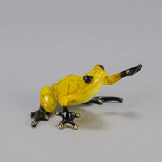 Chai - A vibrant limited edition bronze sculpture by Tim Cotterill of a yellow frog with its head raised, reaching out with its front leg, exhibiting very fine bright enamel colours and excellent tactile surface