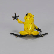 Chai - A vibrant limited edition bronze sculpture by Tim Cotterill of a yellow frog with its head raised, reaching out with its front leg, exhibiting very fine bright enamel colours and excellent tactile surface