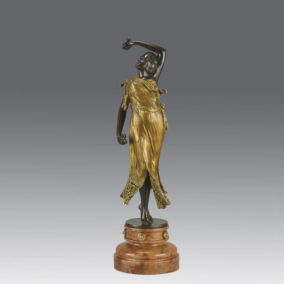 Flamenco Dancer by T Curts a charming Art Nouveau bronze figure of a flamboyant flamenco dancer holding a striking pose, her diaphonous gilded dress seductively draped over her, pinned and hinged to be removed in order to reveal her beautiful naked body