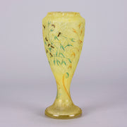 Bees and Flowers Vase by Daum Frères a late 19th Century French cameo glass vase etched and enamelled with a hive of bees pollinating flowers against a pale yellow field