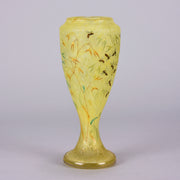 Bees and Flowers Vase by Daum Frères a late 19th Century French cameo glass vase etched and enamelled with a hive of bees pollinating flowers against a pale yellow field