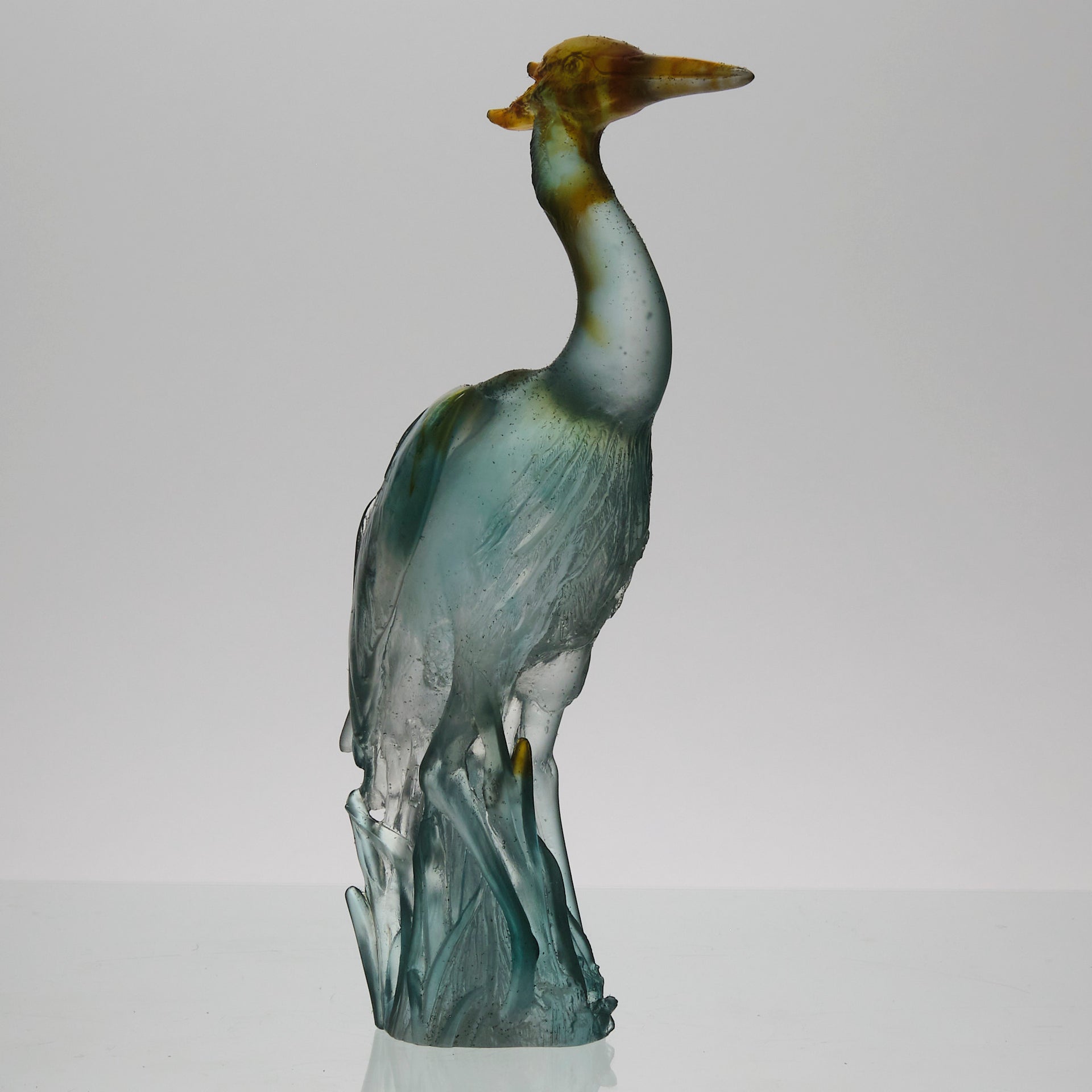 Heron by Daum Glass a fabulous pate de verre glass study of a heron standing in an alert position exhibiting attractive translucent colours ranging from a red/orange to a light blue
