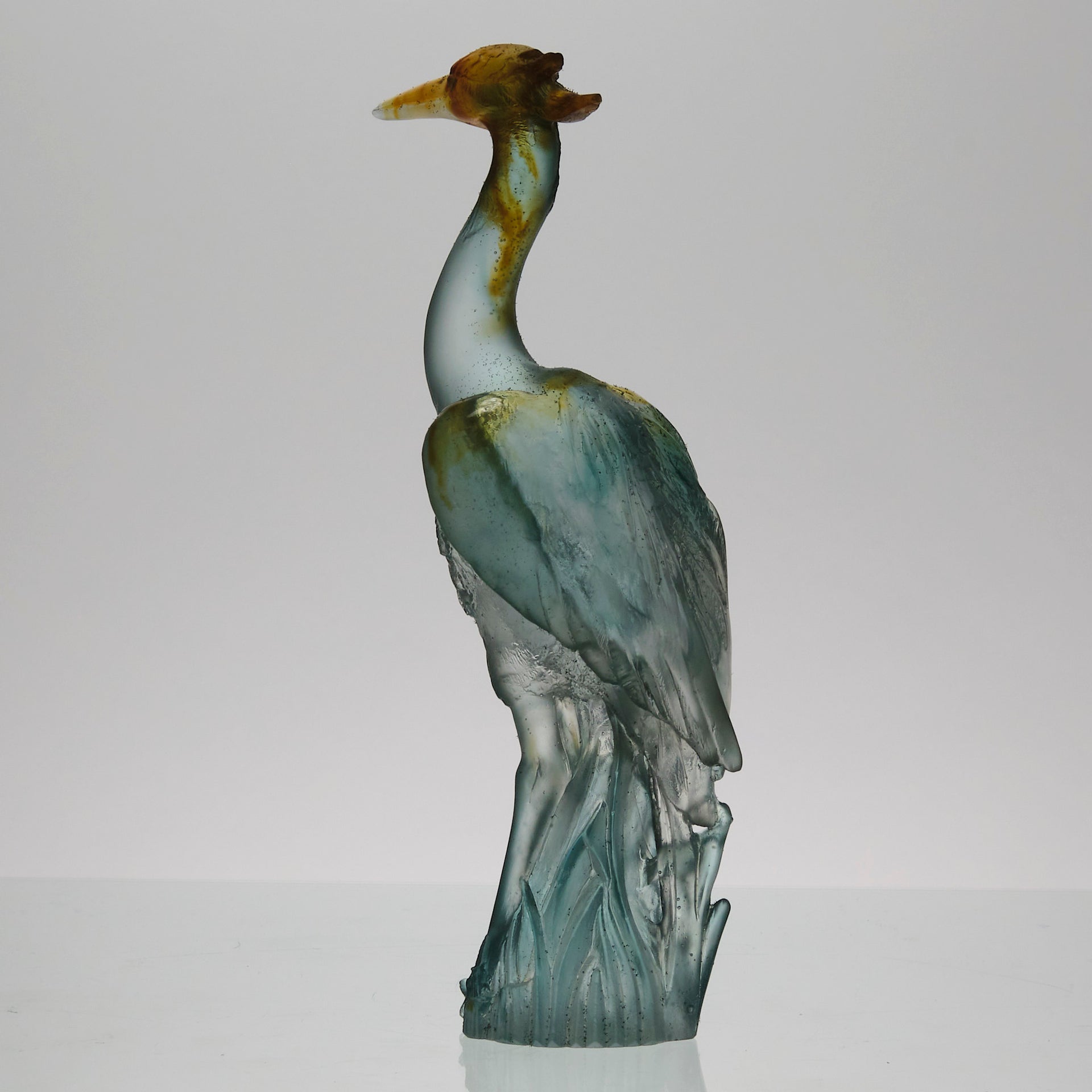 Heron by Daum Glass a fabulous pate de verre glass study of a heron standing in an alert position exhibiting attractive translucent colours ranging from a red/orange to a light blue