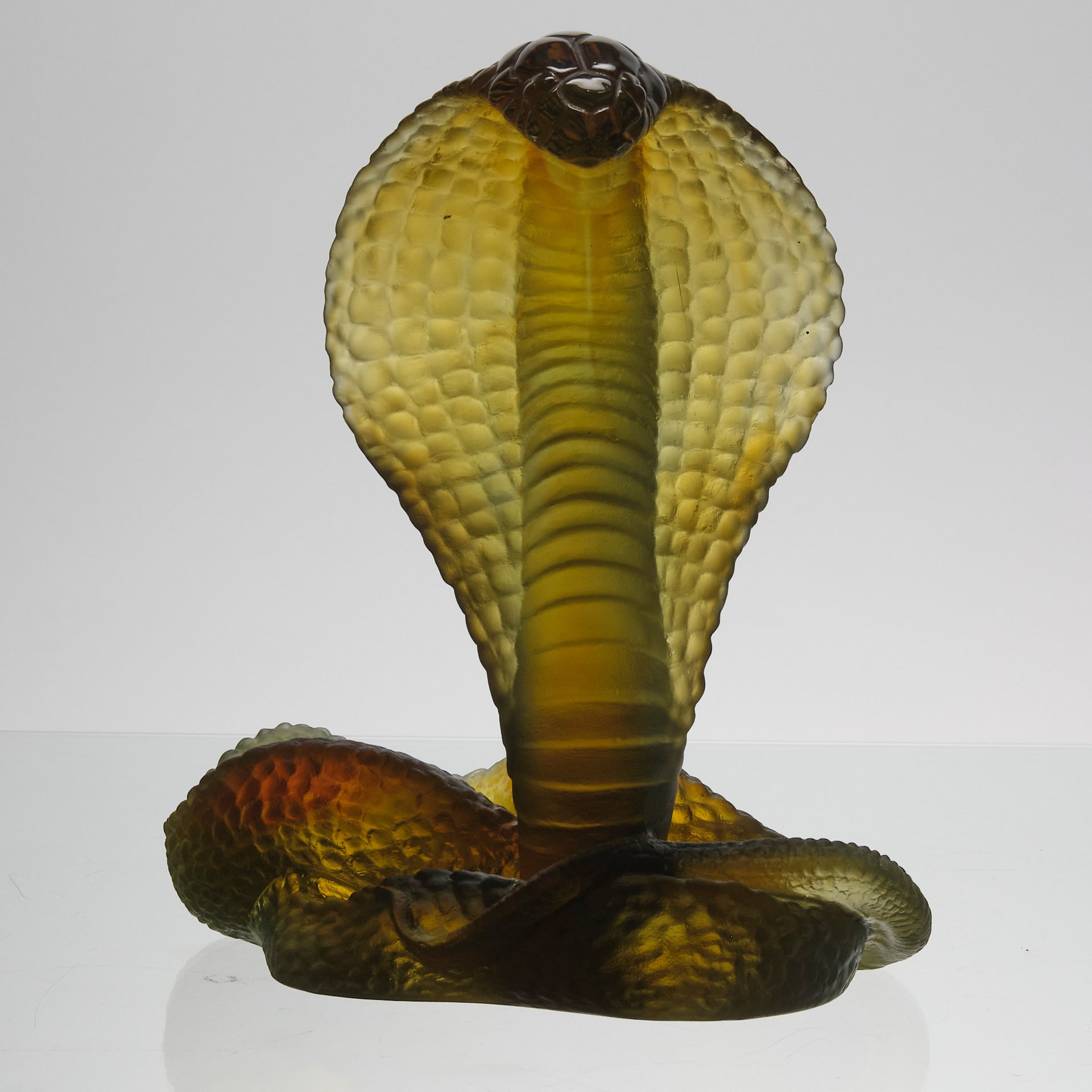 Rearing Cobra by Daum Glass a limited edition French glass figure of a rearing cobra. The striking pate-de-verre model in naturalistic variegated green colour 