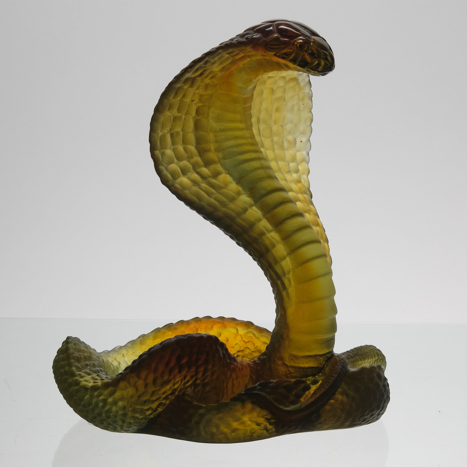 Rearing Cobra by Daum Glass a limited edition French glass figure of a rearing cobra. The striking pate-de-verre model in naturalistic variegated green colour 